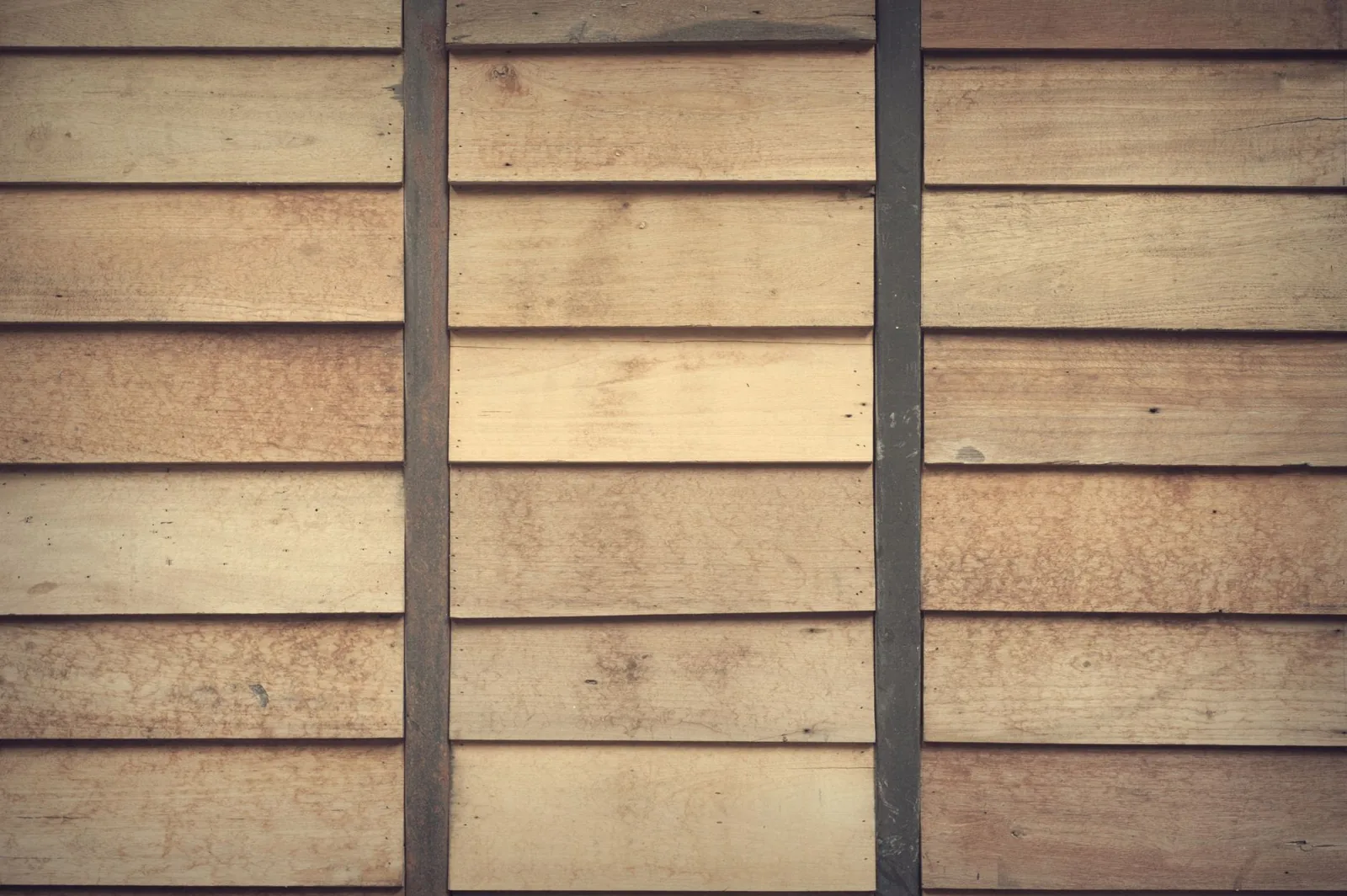 Board and batten siding explained with wide vertical boards and raised battens