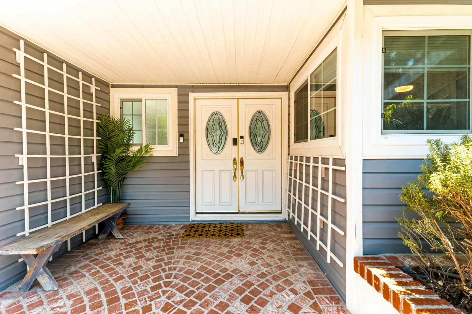 Popular front door color ideas on a welcoming residential porch